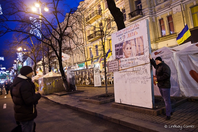 Ukrainian man posing in front of the Timoshenko camp in Kiev, Ukraine. 