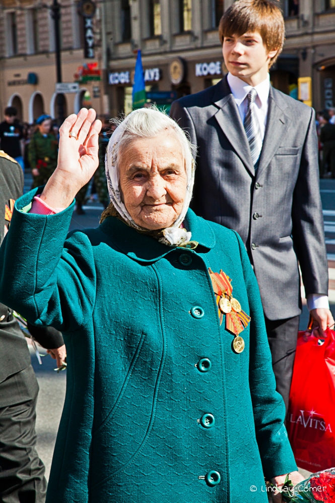 A babushka marching in the Victory Day Parade in Saint Petersburg, Russia.