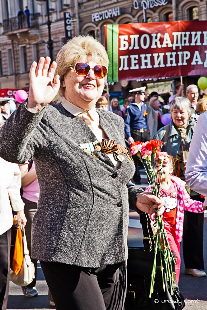 A Russian woman marching in the Victory Day Parade, Saint Petersburg, Russia.